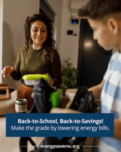 A woman packs a lunchbox while a child stands nearby. Text promotes lowering energy bills at energysaverNC.org.